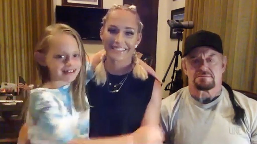 Undertaker’s family joins him for a candid interview with Mario Lopez