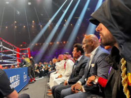 🎤 Eminem and Vince McMahon share a moment in Saudi Arabia! The rap legend sits next to the wrestling mogul at a major boxing event. 🥊 #Eminem #VinceMcMahon #BoxingInSaudi