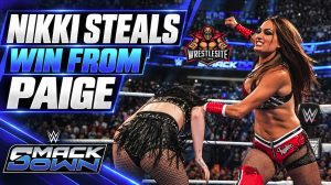 Nikki Bella uses the ropes for leverage while pinning Paige during their WWE SmackDown match in Mexico City